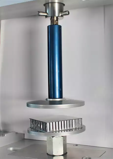 tensile tester grips: Tensor_Check: compression plates. Testing on aluminum honeycomb panel