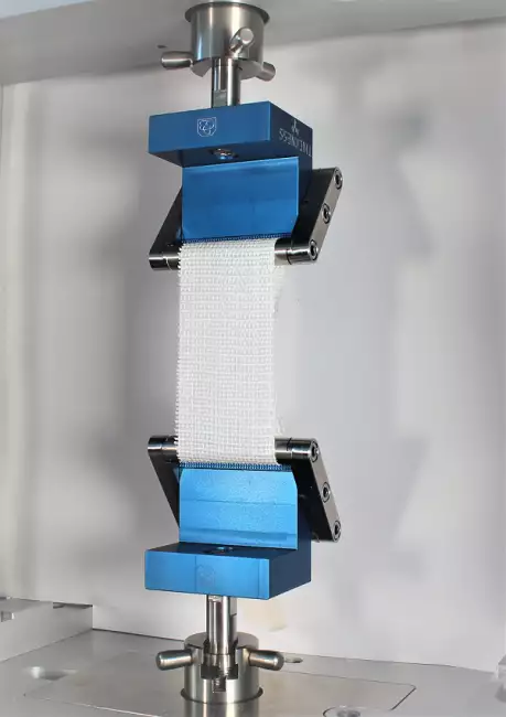 tensile tester grips: Tensor_Check: self-stretching manual rib clamps. Example of tensile test on fabric.