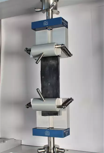 tensile tester grips: Tensor_Check: manual needle roller clamps for tensile testing. Example of testing on rubber sheet.