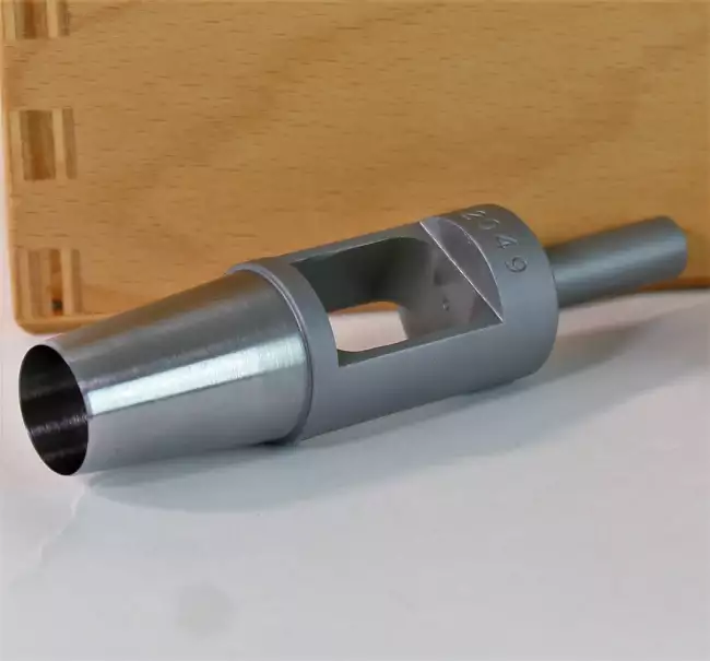 abrasion tester: Abrasion Check: detail of the rotary die for preparing specimens to standard.