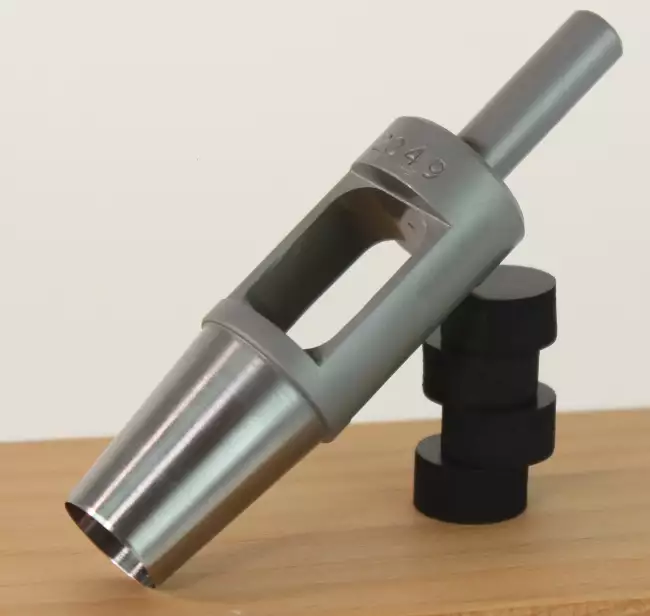 abrasion tester: Abrasion Check: rotary die for preparation of specimens to standards.