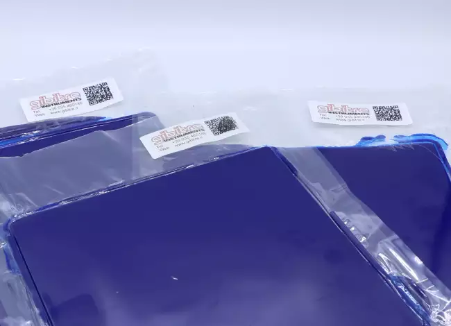 lab press auto loader: Lab press with automatic loader: plates produced automatically in sequence.